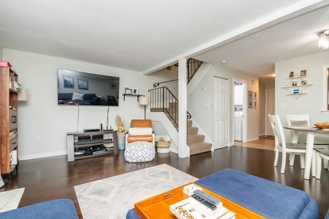 3 Beals Cv Unit F, Hingham, MA 02043 - living area featuring wood finished floors, stairs, washer / dryer, a textured ceiling, and baseboards