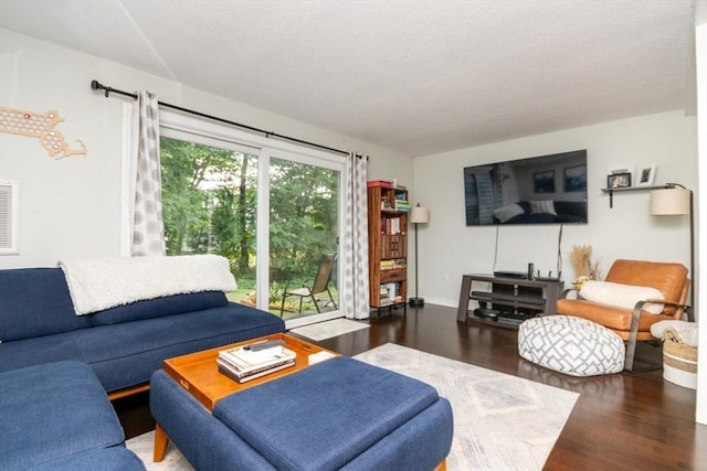 3 Beals Cv Unit F, Hingham, MA 02043 - living area with wood finished floors and a textured ceiling
