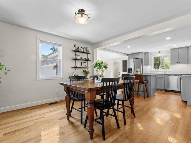 17 Clifton Ave, Scituate, MA 02066 - dining room with light wood-type flooring and recessed lighting