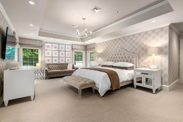 bedroom with wallpapered walls, ornamental molding, a raised ceiling, light carpet, and a chandelier