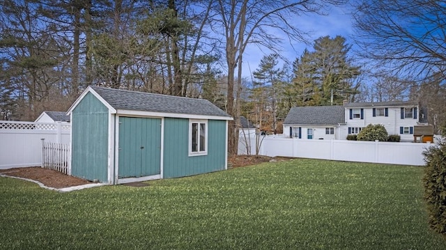 view of shed featuring a fenced backyard