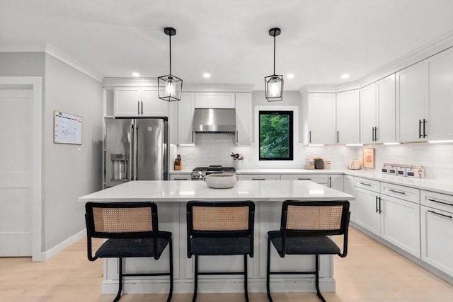 103 Warwick Rd Unit 103, Newton, MA 02465 - kitchen featuring stainless steel appliances, ventilation hood, backsplash, light wood-style floors, and recessed lighting
