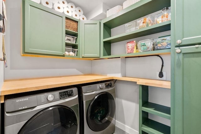 103 Warwick Rd Unit 103, Newton, MA 02465 - washroom featuring separate washer and dryer and cabinet space
