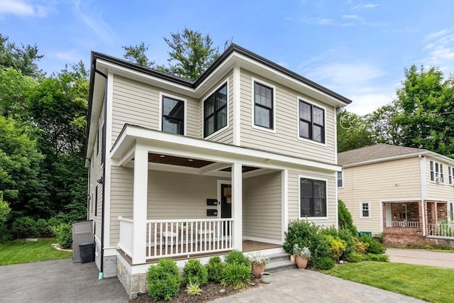 103 Warwick Rd Unit 103, Newton, MA 02465 - view of front of property with covered porch