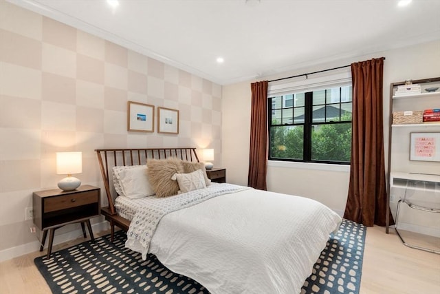 103 Warwick Rd Unit 103, Newton, MA 02465 - bedroom featuring light wood finished floors, recessed lighting, and ornamental molding