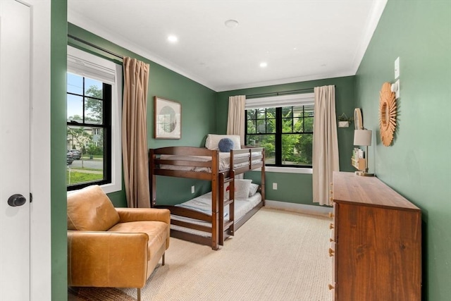 103 Warwick Rd Unit 103, Newton, MA 02465 - bedroom featuring multiple windows, ornamental molding, light carpet, and recessed lighting
