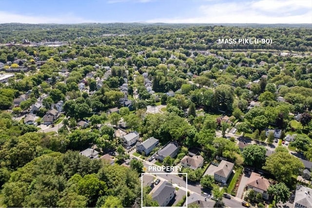 103 Warwick Rd Unit 103, Newton, MA 02465 - aerial view of residential area with property parcel outlined and a heavily wooded area