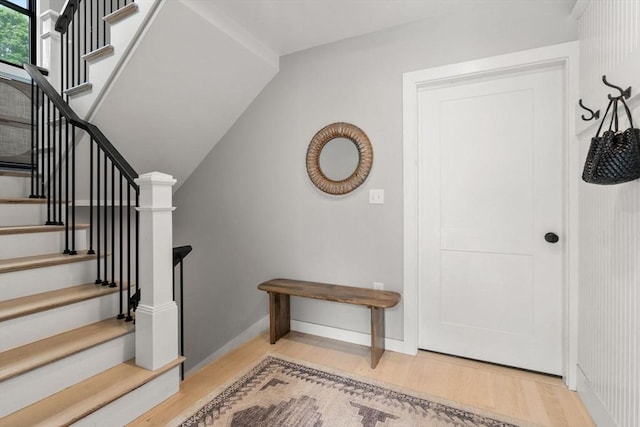 103 Warwick Rd Unit 103, Newton, MA 02465 - entryway featuring wood finished floors and stairway