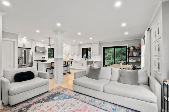 103 Warwick Rd Unit 103, Newton, MA 02465 - living area with recessed lighting, light wood-type flooring, and ornate columns