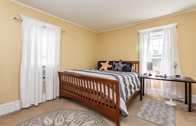 carpeted bedroom featuring ornamental molding