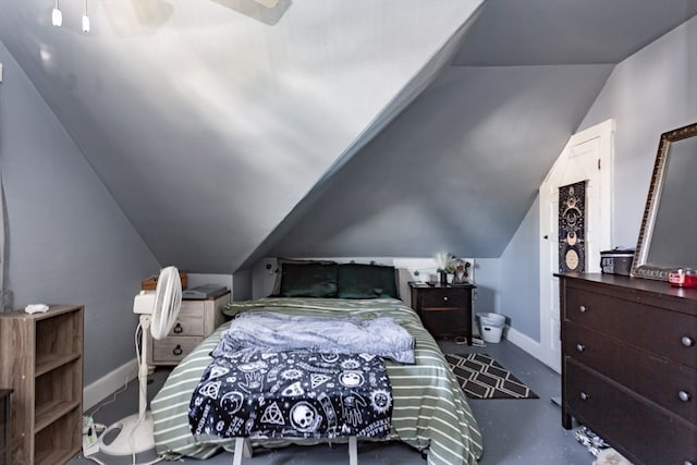 bedroom with lofted ceiling and ceiling fan