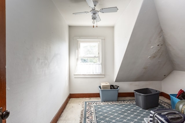 additional living space featuring lofted ceiling and ceiling fan