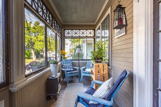 sunroom / solarium featuring plenty of natural light