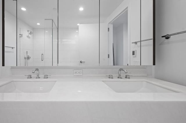 100 Lovejoy Wharf Unit 6J, Boston, MA 02114 - full bath featuring a stall shower, double vanity, and recessed lighting