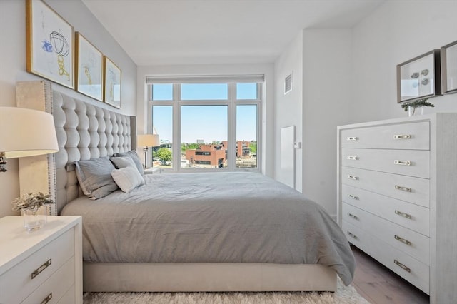 100 Lovejoy Wharf Unit 6J, Boston, MA 02114 - bedroom with wood finished floors