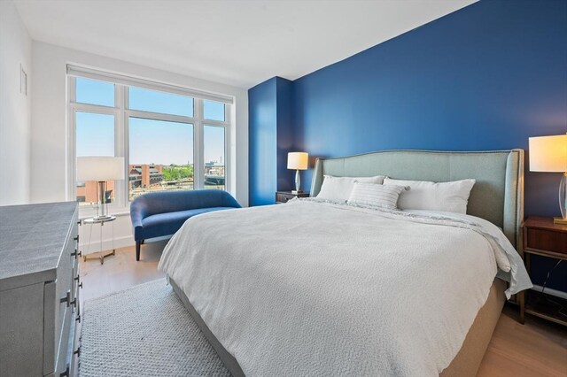 100 Lovejoy Wharf Unit 6J, Boston, MA 02114 - bedroom featuring wood finished floors
