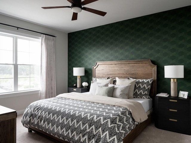 bedroom featuring ceiling fan and carpet flooring