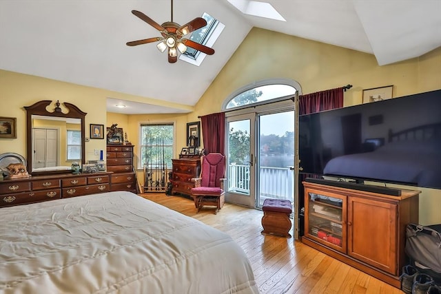 371-377 Franklin St, Wrentham, MA 02093 - bedroom featuring a skylight, access to exterior, high vaulted ceiling, light wood-style floors, and ceiling fan