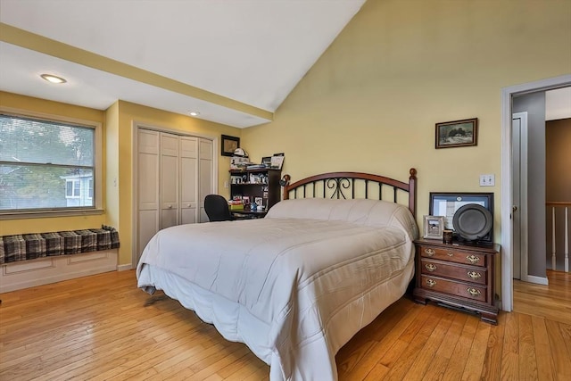 371-377 Franklin St, Wrentham, MA 02093 - bedroom with light wood-style flooring, high vaulted ceiling, and a closet