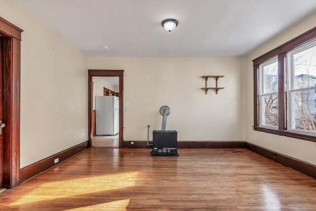 unfurnished room featuring wood-type flooring