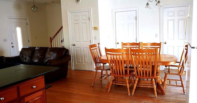 97-99 N St Unit 97, Newton, MA 02460 - dining space with dark wood-style floors and crown molding