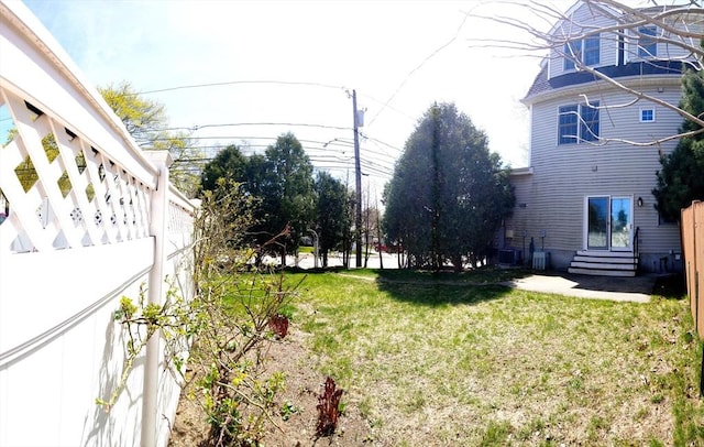 97-99 N St Unit 97, Newton, MA 02460 - view of grassy yard with cooling unit and entry steps
