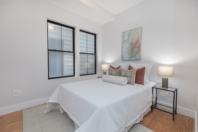 bedroom with light hardwood / wood-style flooring