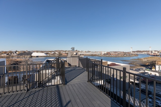 deck featuring a water view