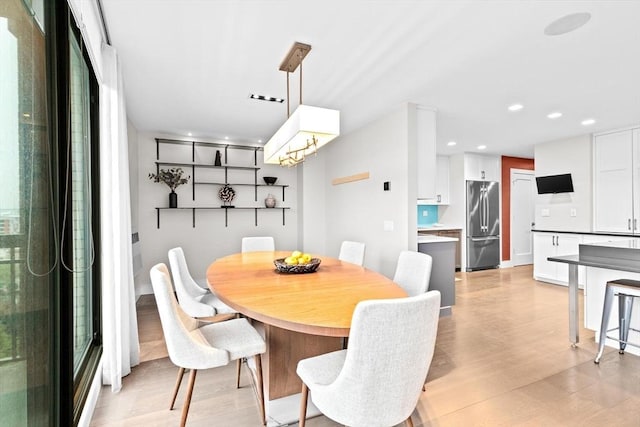 50 Longwood Ave Unit 1016/1017, Brookline, MA 02446 - dining space featuring a chandelier, recessed lighting, and light wood-style flooring