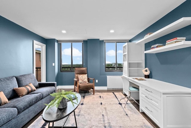 50 Longwood Ave Unit 1016/1017, Brookline, MA 02446 - office space with built in desk, wood finished floors, recessed lighting, radiator, and baseboards