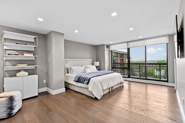 50 Longwood Ave Unit 1016/1017, Brookline, MA 02446 - bedroom featuring access to outside, baseboards, wood finished floors, and recessed lighting