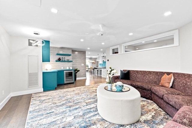 50 Longwood Ave Unit 1016/1017, Brookline, MA 02446 - living area featuring wine cooler, dark wood finished floors, baseboards, recessed lighting, and a ceiling fan