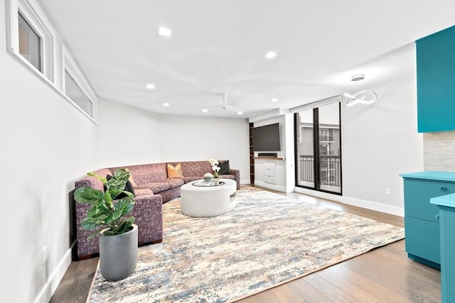 50 Longwood Ave Unit 1016/1017, Brookline, MA 02446 - living area featuring wood finished floors, baseboards, and recessed lighting