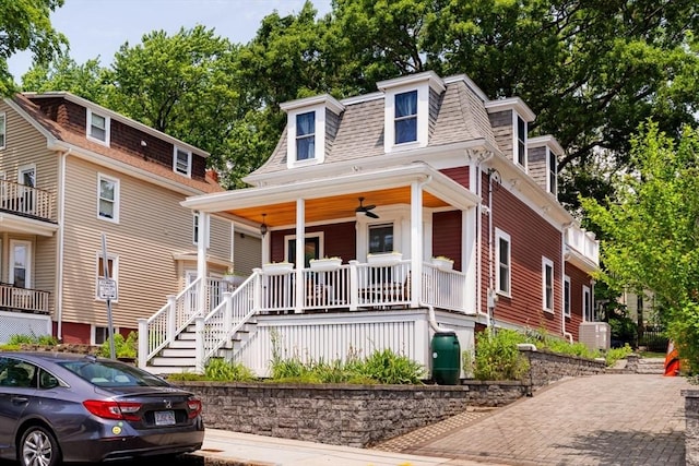 15 Berkeley St, Somerville, MA 02143 - victorian home with covered porch, mansard roof, and a shingled roof
