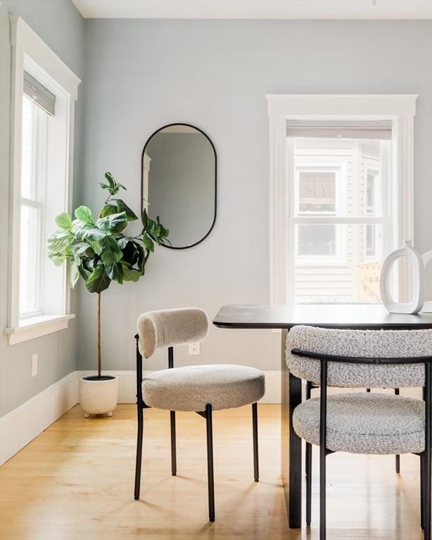 15 Berkeley St, Somerville, MA 02143 - sitting room with healthy amount of natural light and light wood-style floors