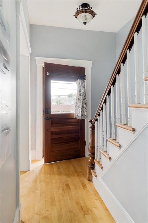 15 Berkeley St, Somerville, MA 02143 - entryway with stairway and wood finished floors