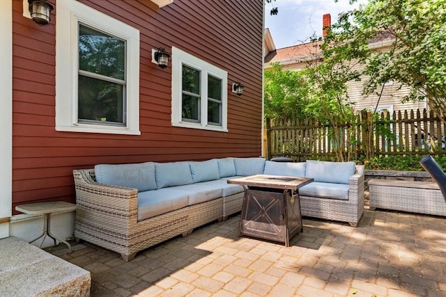 15 Berkeley St, Somerville, MA 02143 - view of patio featuring an outdoor living space with a fire pit