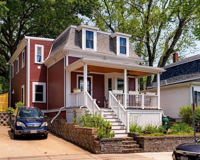 15 Berkeley St, Somerville, MA 02143 - victorian home with roof with shingles, mansard roof, a porch, and driveway