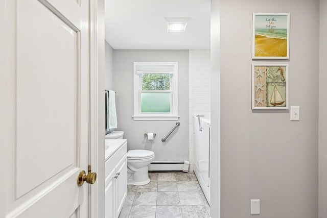 22 Woodside Dr, Falmouth, MA 02536 - full bath featuring baseboard heating, toilet, vanity, marble finish floors, and baseboards