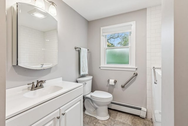 22 Woodside Dr, Falmouth, MA 02536 - bathroom featuring a baseboard heating unit, vanity, and toilet