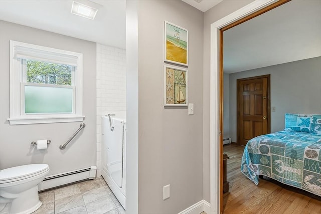 22 Woodside Dr, Falmouth, MA 02536 - bedroom with baseboard heating and baseboards