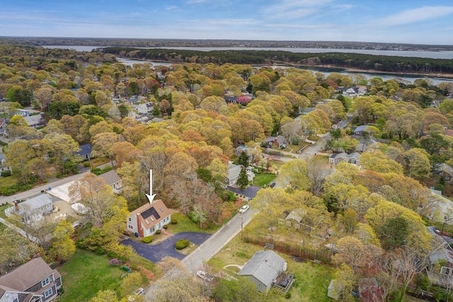 22 Woodside Dr, Falmouth, MA 02536 - view of property location featuring a nearby body of water and a heavily wooded area