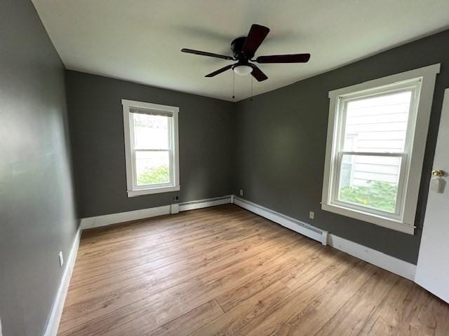 14 Felton St, Fitchburg, MA 01420 - spare room with wood finished floors and a ceiling fan