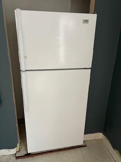 14 Felton St, Fitchburg, MA 01420 - detailed view of freestanding refrigerator and baseboards