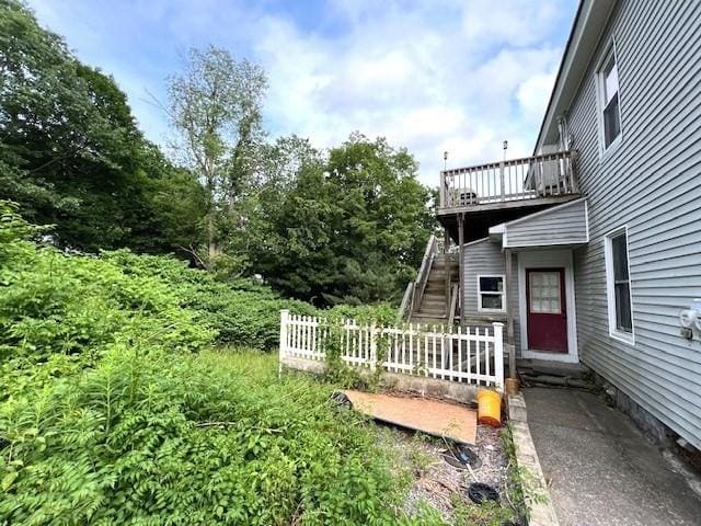 14 Felton St, Fitchburg, MA 01420 - view of yard with a wooden deck and stairway