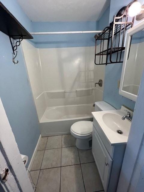 14 Felton St, Fitchburg, MA 01420 - full bath with washtub / shower combination, vanity, and tile patterned floors