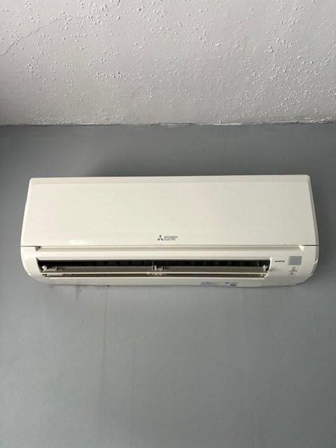 14 Felton St, Fitchburg, MA 01420 - detailed view of a wall mounted AC and a textured ceiling