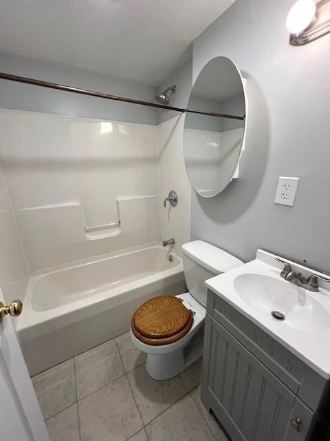 14 Felton St, Fitchburg, MA 01420 - bathroom with shower / bathtub combination, tile patterned flooring, and vanity