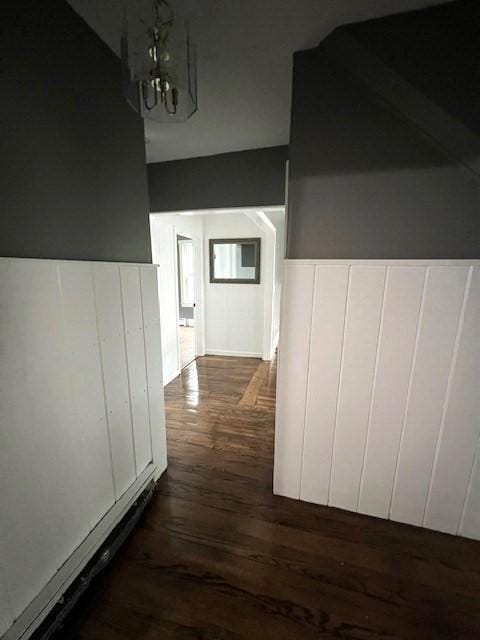 14 Felton St, Fitchburg, MA 01420 - additional living space with a chandelier and dark wood-type flooring