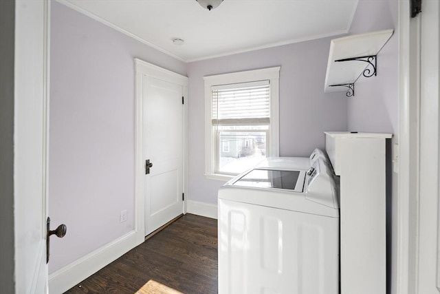 washroom with washing machine and dryer, ornamental molding, and dark hardwood / wood-style flooring